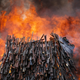 A pile of illegal firearms burns at a field in Ngong, in the outskirts of the capital Nairobi.